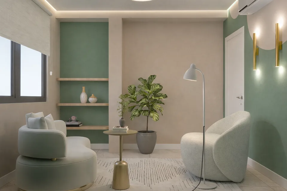 Espaço Acolher: sofá curvo verde-claro, poltrona giratória e planta, com parede verde-sálvia.